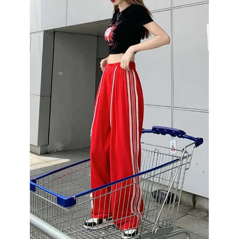 Red track pants
