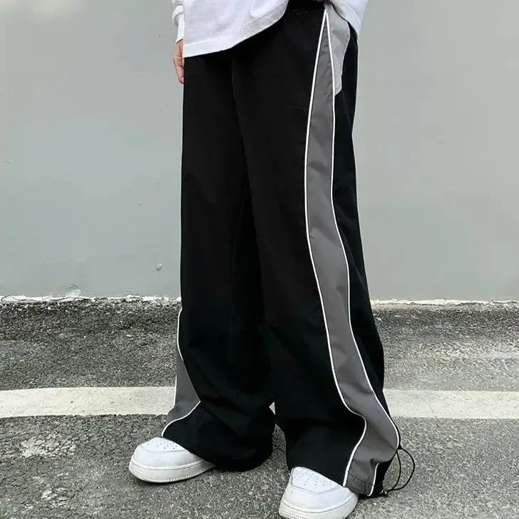 Grey track pants