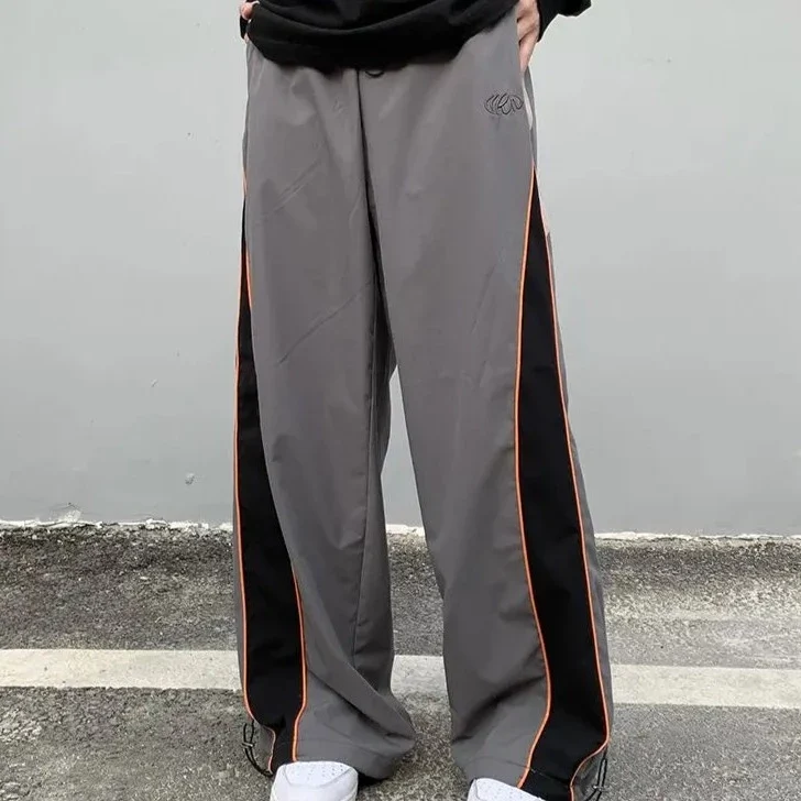 Grey track pants