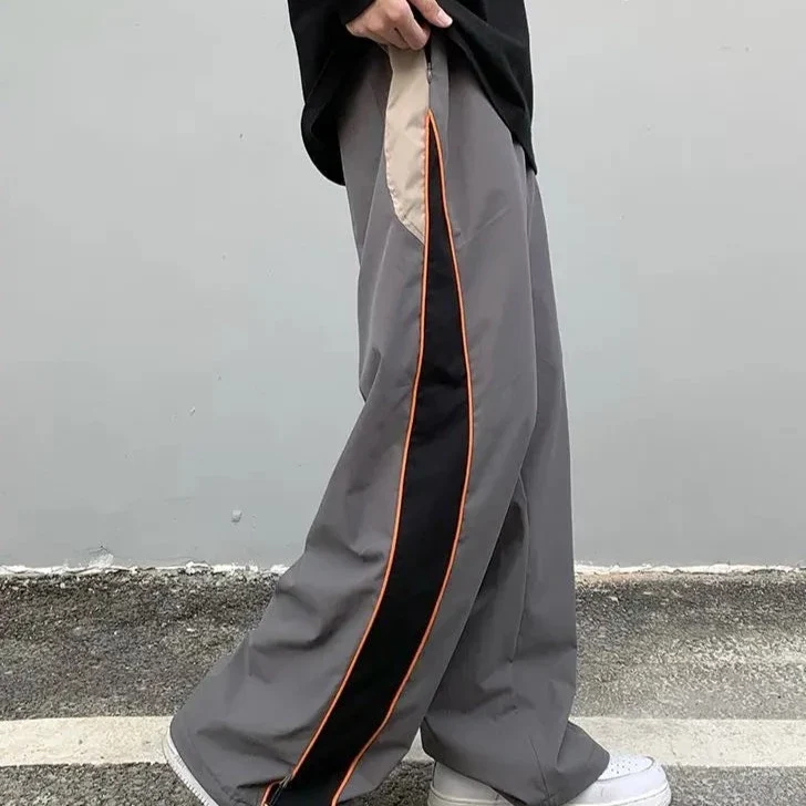 Grey track pants
