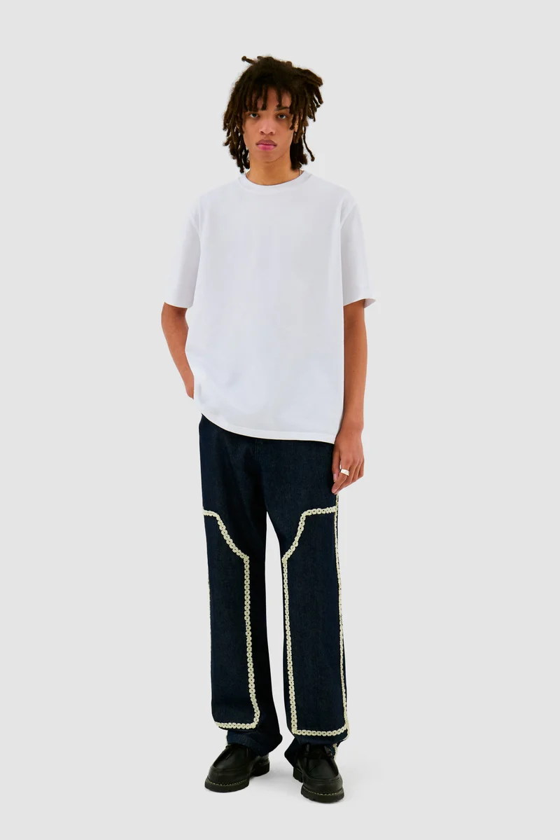 Pantalon en denim à bordures fleuries - Dark Wash