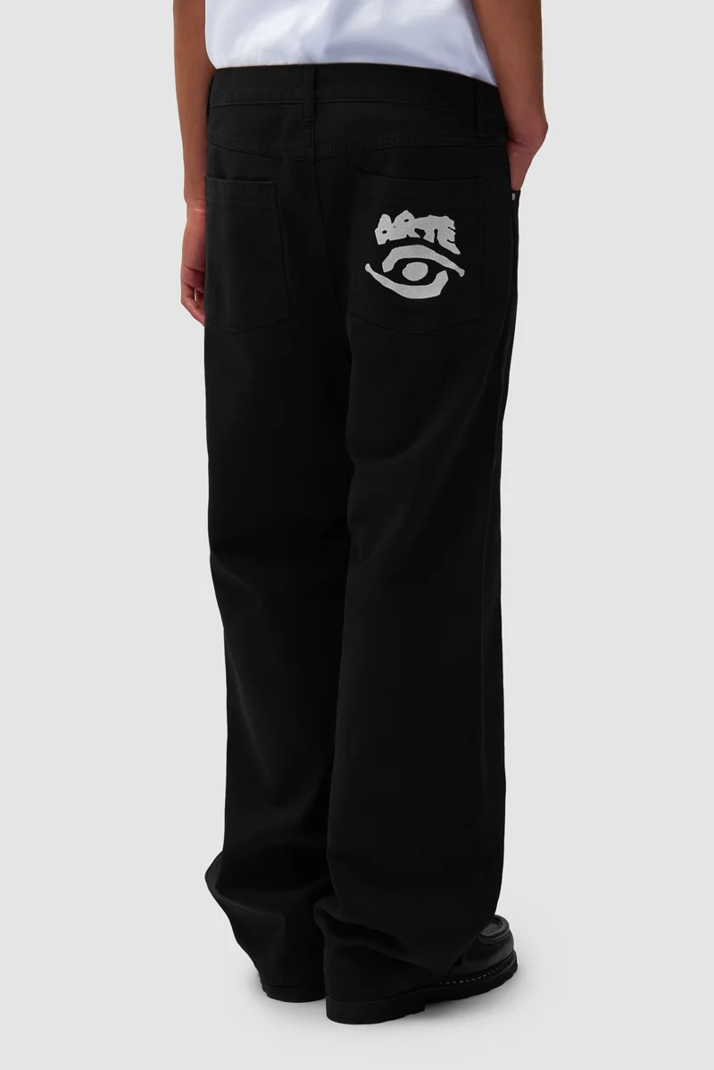 Pantalon graphique à poche arrière - Noir